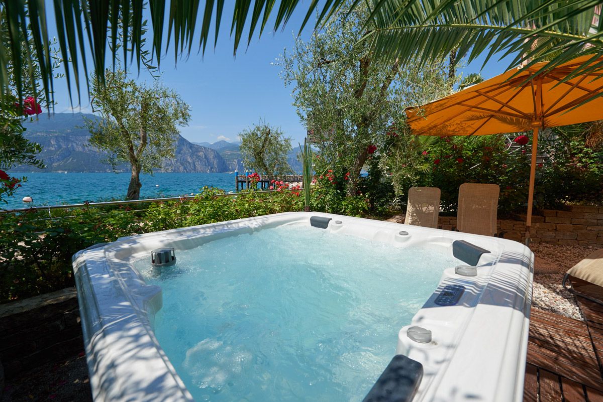The outdoor hot tub five metres from the lake
